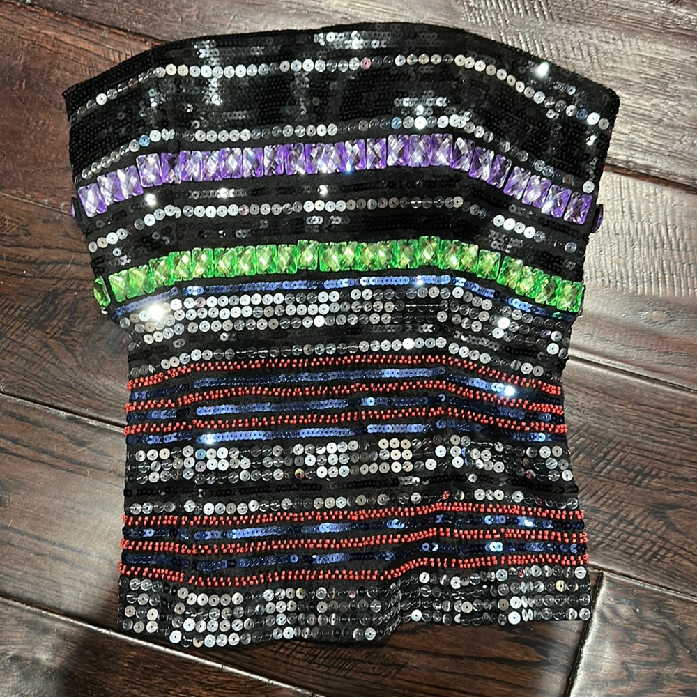 Beautiful top with lots of colors. Dress it up or down either will good great!